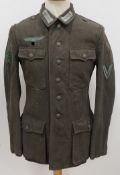 Wehrmacht: Feldbluse für einen Obergefreiten der Jägertruppe.