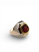 An 18carat Gold Ring with a stunning 6.69 carat natural Purple Sapphire of Kashmir origin , no heat