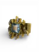 An Aquamarine and Six Baguette Diamond Ring, no marks but tested 18 carat gold, probably British 197