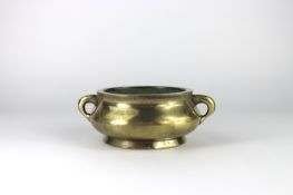 A Bronze Double Handled Incense Burner, gui, six character mark of Xuande, 18th century,