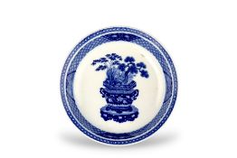 A Blue and White Dish with a Jardiniere, late Kangxi