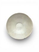 A Carved Dingyao Double Fish Bowl, Song dynasty,