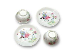 A Pair of Petal Moulded famille rose Cups and Saucers, Yongzheng period,
