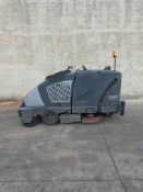 Nilfisk Advance CS7000 Hybrid combination sweeper-scrubber industrial floor cleaning machine