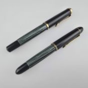 Zwei Kolbenfüller von Pelikan - 20. Jh., Metall vergoldet, Federn jeweils Gelbgold 585, beide gemar