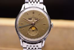 Omega Cosmic: A Fine and Rare Triple Calendar Wristwatch with Moon Phase Arabic Ref. 2471 C.1950