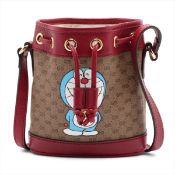Gucci x Doraemon Mini GG Supreme Bucket Bag