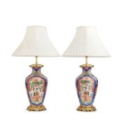 A pair of late 19th century gilt bronze mounted Japanese porcelain vases adapted as lamp bases T...