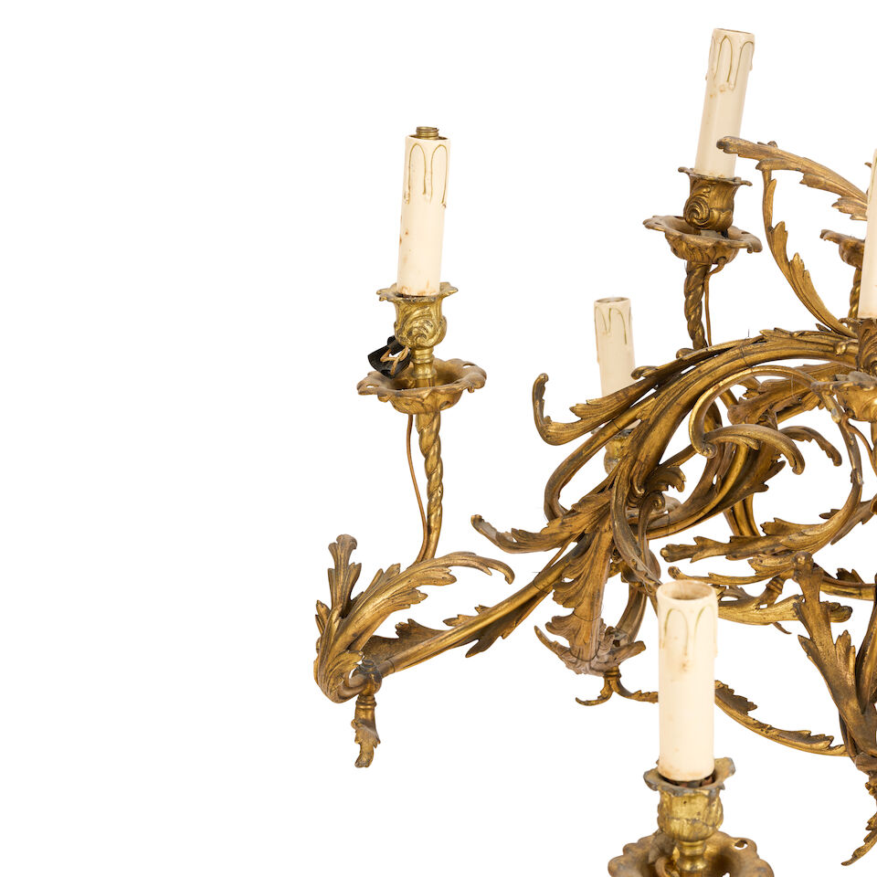 A late 19th century French gilt bronze and patinated figural twelve ...