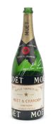 A Moet & Chandon Champagne bottle signed by Ayrton Senna, dated 91',