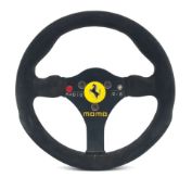 A Ferrari F1/87 steering wheel, used by Michele Alboreto,