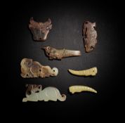A GROUP OF SEVEN JADE ORNAMENTS Western Zhou Dynasty (7)