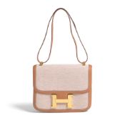 HERMÈS: ECRU TOILE AND GOLD BOX LEATHER CONSTANCE 23 1974