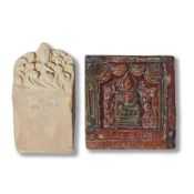 A GREEN AND OCHRE-GLAZED POTTERY 'BUDDHA' TILE AND A MOULDED POTTERY TILE Tang Dynasty, dated to...