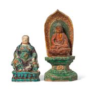 A FAHUA-GLAZED FIGURE OF ZHENWU AND A SANCAI GLAZED MODEL OF BUDDHA Ming Dynasty, 16th century (4)