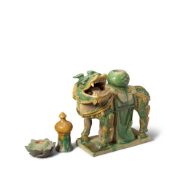 A LARGE GLAZED POTTERY CAPARISONED LION AND TWO ARCHITECTURAL ELEMENTS Ming Dynasty (3)
