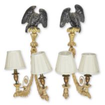 A pair of Regency carved giltwood and gesso twin branch wall lights Early 19th century (2)