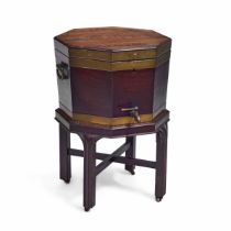 A large George III mahogany and brass bound octagonal cellarette Third quarter 18th century