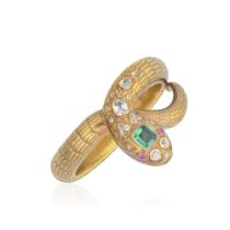 EMERALD, DIAMOND AND RUBY-SET SNAKE BANGLE, LATE 19TH CENTURY