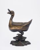 A PARTIALLY GILT BRONZE 'DUCK' INSENSE BURNER AND COVER Ming Dynasty