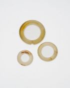 THREE AGATE RINGS Han Dynasty or later (3)