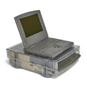 A CLEAR PLASTIC PROTOTYPE APPLE MACINTOSH POWERBOOK DUO DOCK WITH AN APPLE POWERBOOK DUO 280. Ap...
