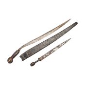A CAUCASIAN DAGGER, AND A FILIPINO MACHETE.