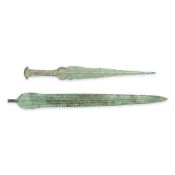 A BRONZE SPEAR AND DAGGER.