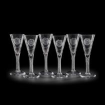 A matched set of six etched and air-twist clear glass wine goblets, in the 18th century Jacobite...