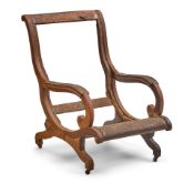Classical Carved Mahogany Lolling Chair Northeastern United States, c. 1830