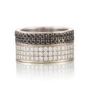 CHOPARD: AN 18K WHITE GOLD, COLORED DIAMOND, AND DIAMOND RING