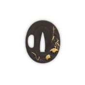 An Oval Shibuichi Tsuba Japan, Edo period (1615-1868), 19th century,