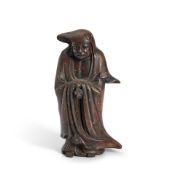 A Bronze Figure of Daruma Japan, late Edo period (1615-1868) or Meiji era (1868-1912), 19th/20th...