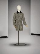 Christian Dior, collection Haute Couture, circa 1980. Veste longue cintrée pied de poule. Ch...