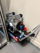 Lotus Laser System and Receiver Mounted Compressor