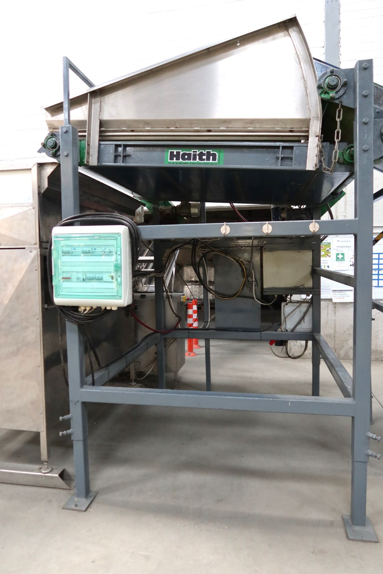 Haith Rise and Fall Even Flow Hopper with Sensors, Controls on Metal Stand. This lot is subject to