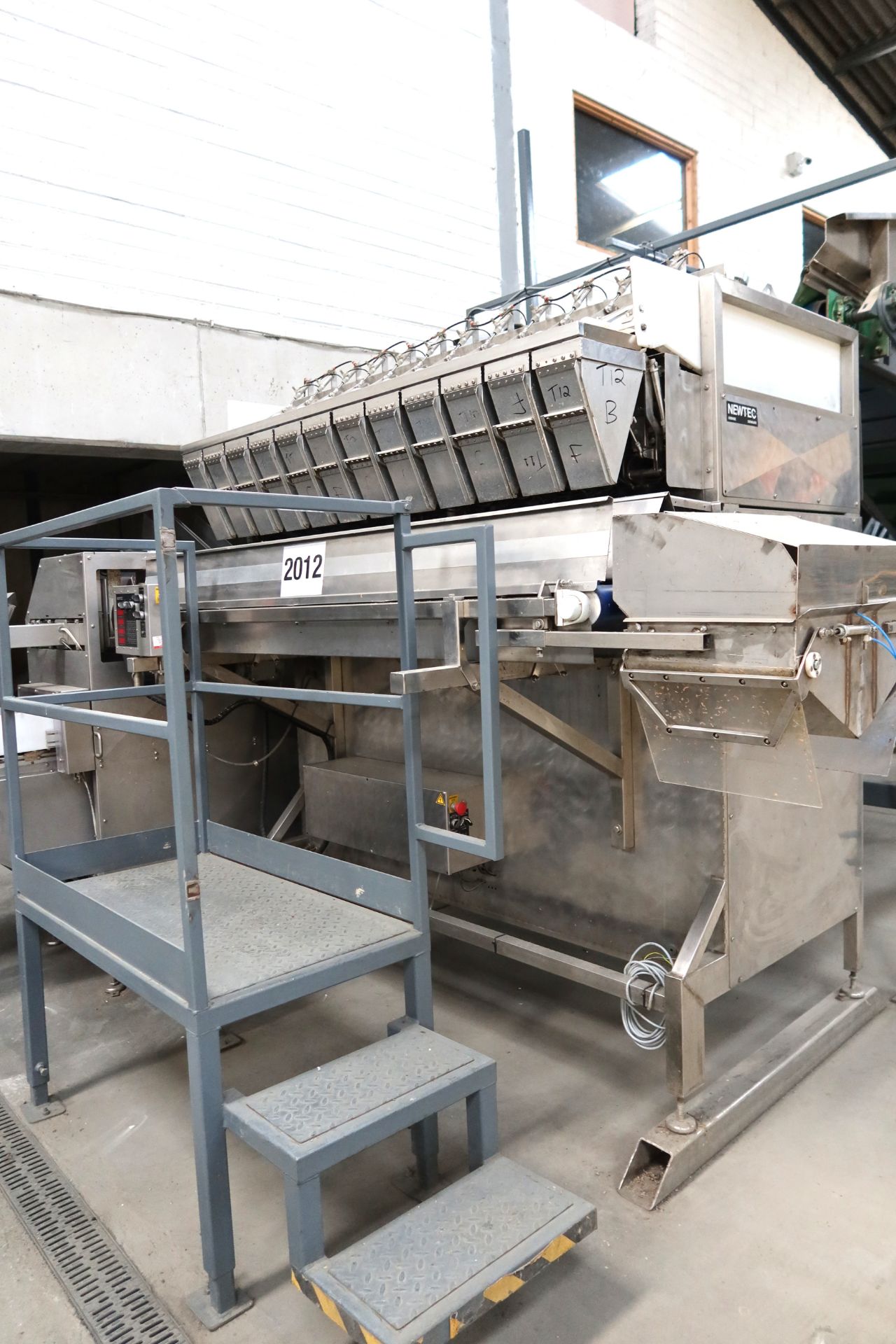 2016, Newtec DG 20 Series, 12 Head Multi Weigher, Type: 2012 DG, No: 11922. This lot is subject to