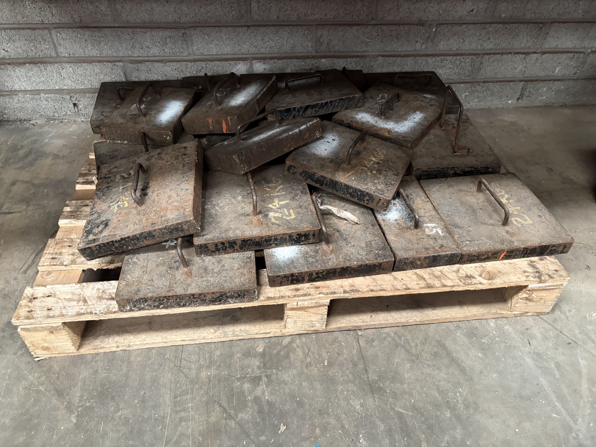 Pallet of weight calibration weights.