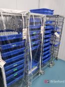 (4) Rolling racks w/ (2) Plastic Covers Trays included