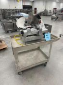 Berkel Meat Slicer, Model 818, Serial# 9161-0111-14401. With plastic cart.