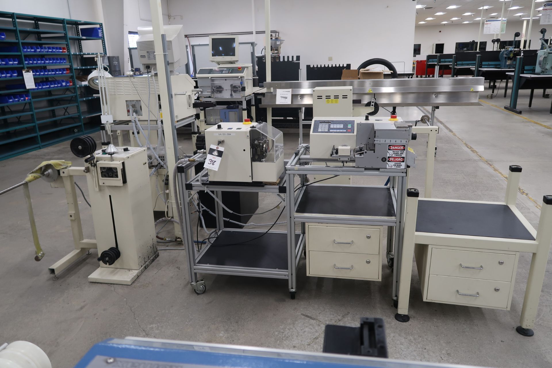 Schleuiger Universal Automatic Cutter Mod. OC3950 Schleuiger Jacket striping Machine Mod. 8300