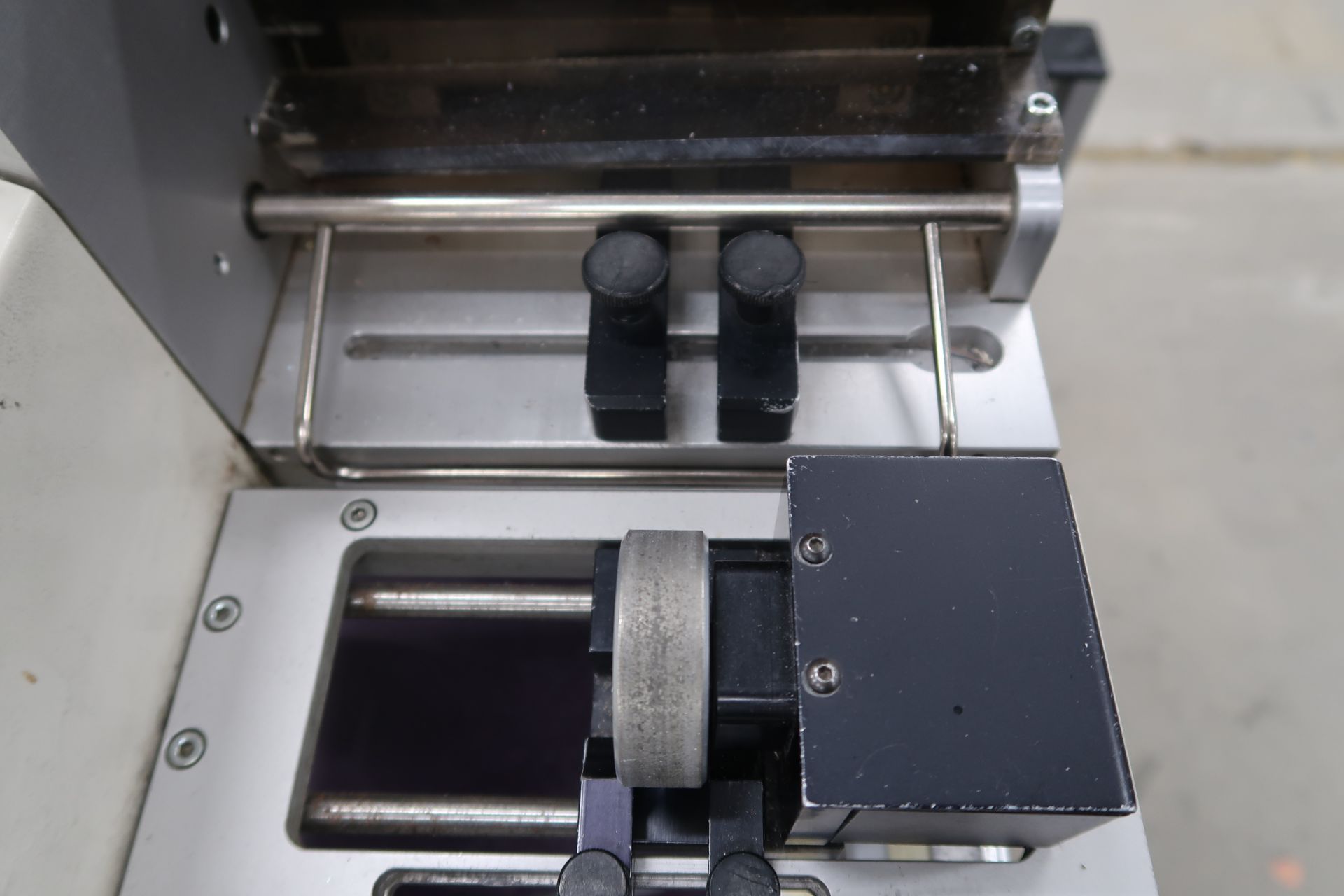 Schleuiger Universal Automatic Cutter Mod. OC3950 Schleuiger Jacket striping Machine Mod. 8300 - Image 9 of 26