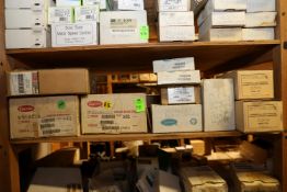 Contents of one side of shelf including zone control boards, circuit boards, bypass controller, and