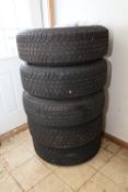 Five Goodyear Wrangler tires and Jeep wheels, wheels are 18" in diameter, new