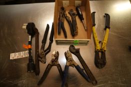 Miscellaneous tools including 14-inch bolt cutters, adjustable pliers, adjustable wrenches