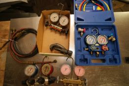 Manifold gauges including Yellow Jacket, two JB, and manifold gauge model MG-2-R134A in case