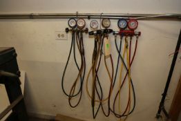 Three manifold gauges including one Snap-On and two JB