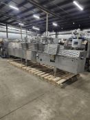 Cavanna Mdl. 04 Sanitary Flow Wrapping System, Ser. #5292, stainless steel with manual 6" wide