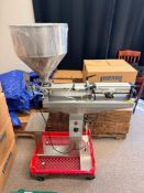 DESCRIPTION STAINLESS STEEL PNEUMATIC PISTON FILLER / DEPOSITING MACHINE WITH HOPPER. DESIGNED FOR L