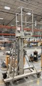 DESCRIPTION GENIE EASY-UP MANUAL PERSONNEL LIFT WITH WORK PLATFORM, FOLDING OUTRIGGERS, HAND WINCH L